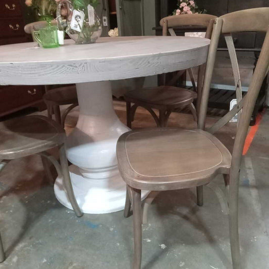 48 round table 4 cross back chairs