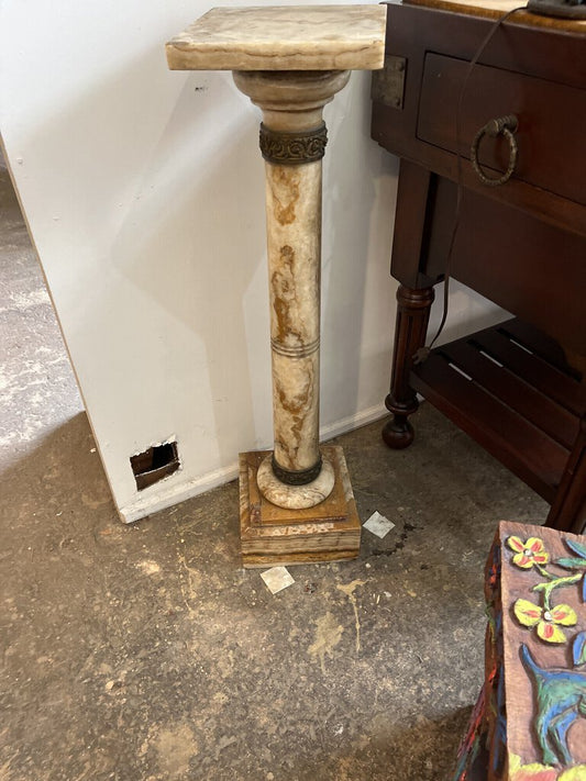 This is a beautiful Italian made pedestal of marble and bronze