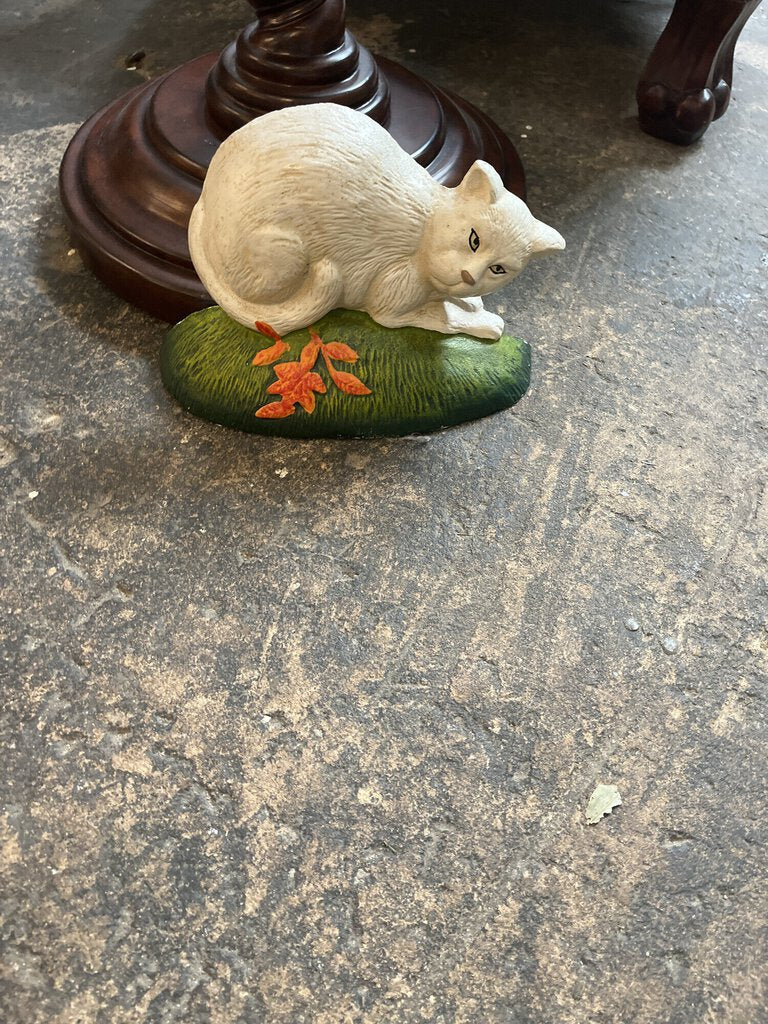 White cat on grass doorstop cast-iron